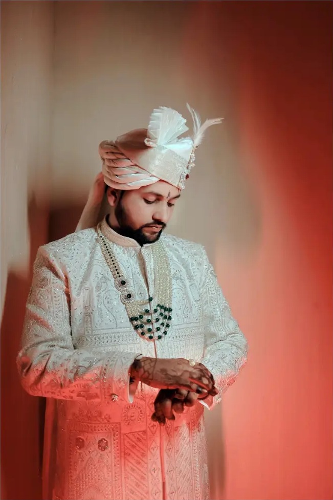 Editorial groom portrait of Sumit in cream sherwani
